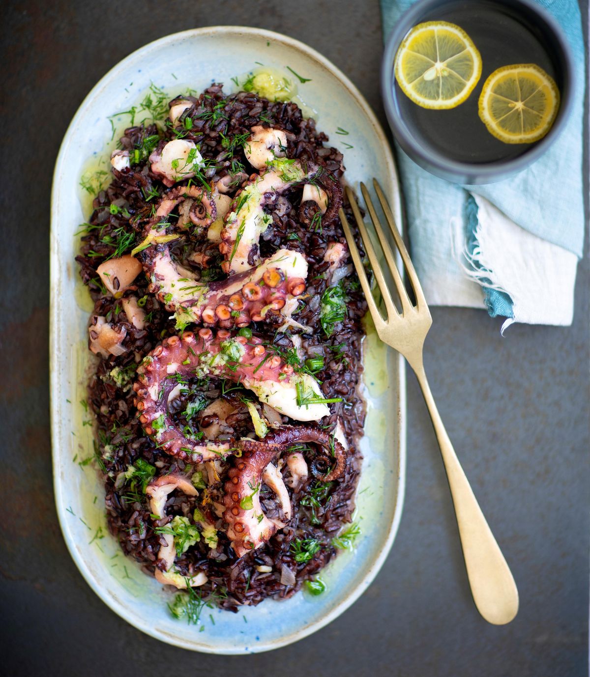 Black risotto with roast octopus and ginger sauce