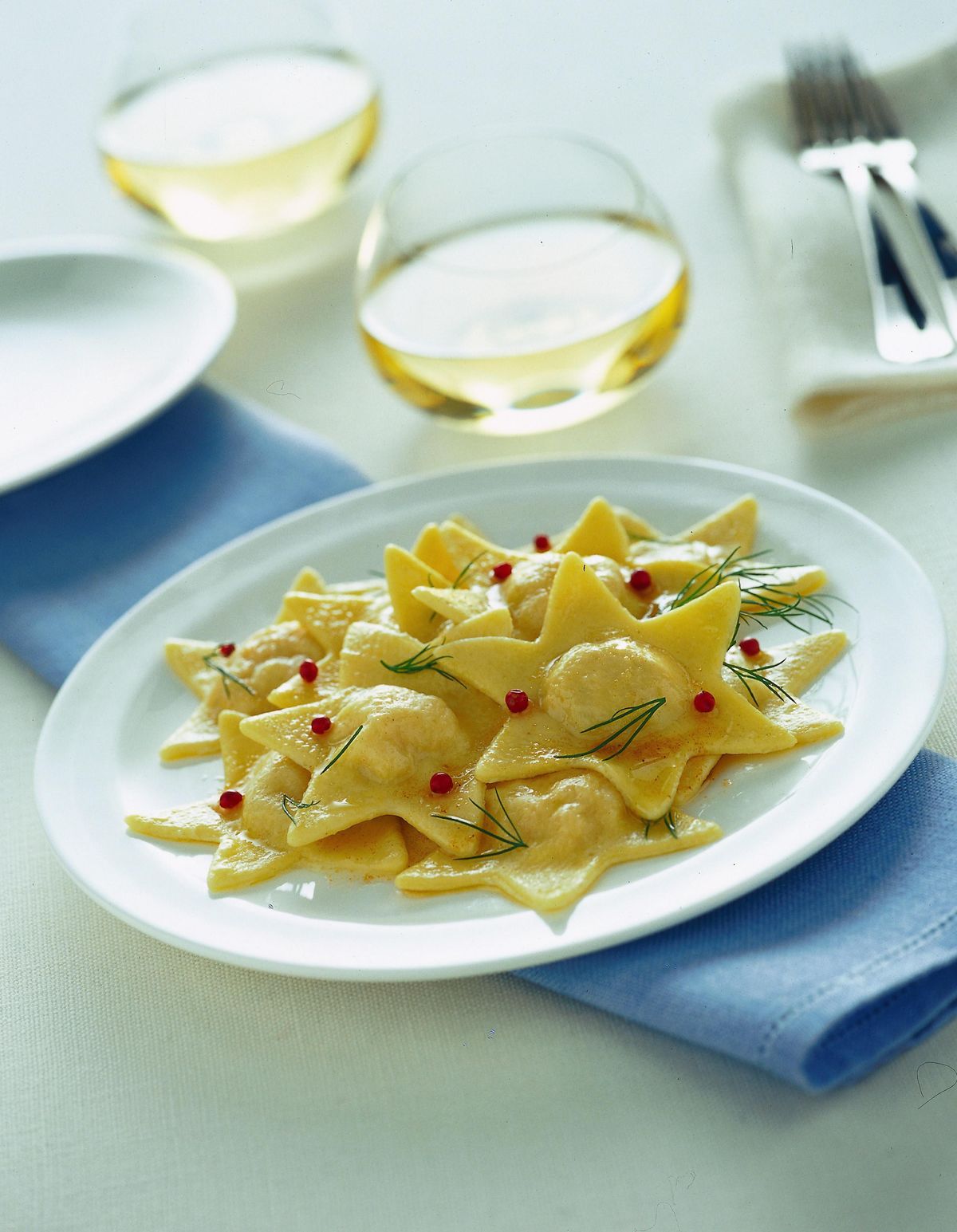Salmon ravioloni with pink pepper butter