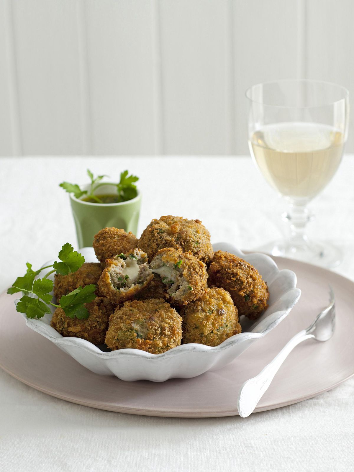 Potatoes croquettes, chard, and mozzarella heart