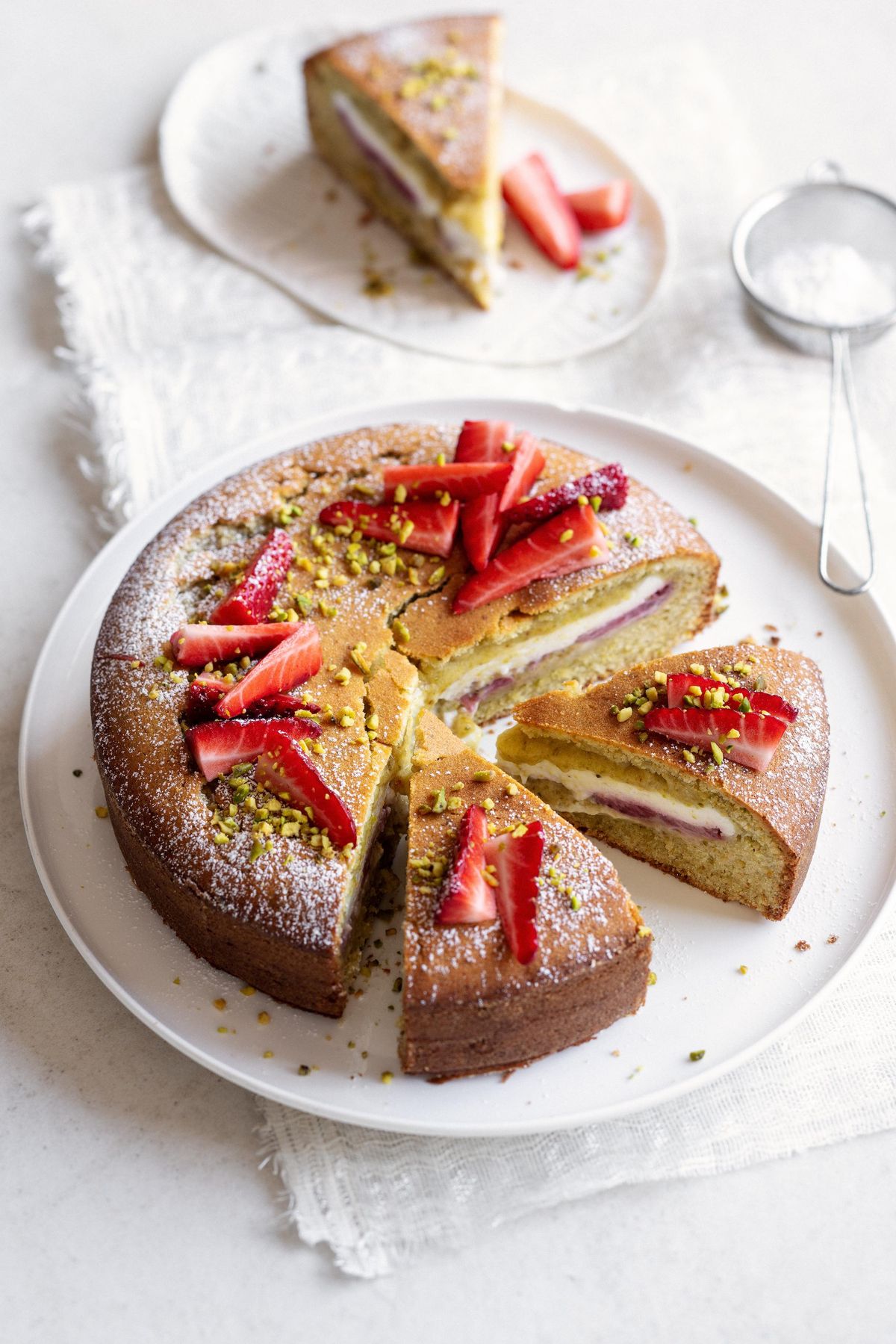 Pistachio cake with strawberries and ricotta