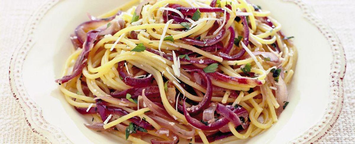 Spaghetti with red onion and salted anchovies