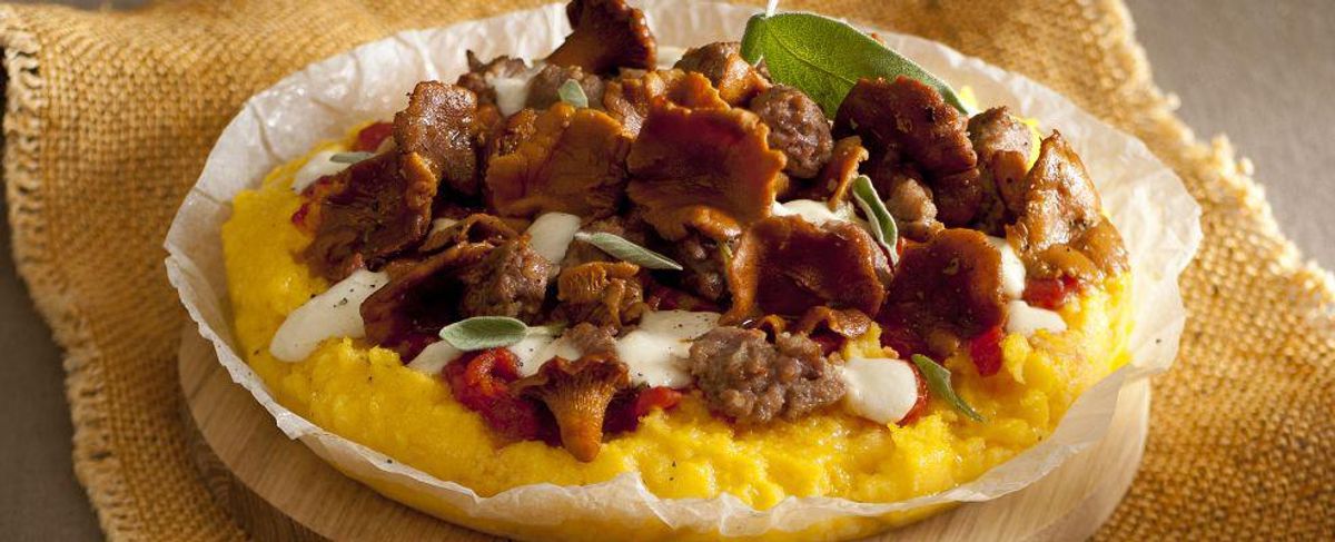 Polenta pizza with fennel mushrooms and sausage