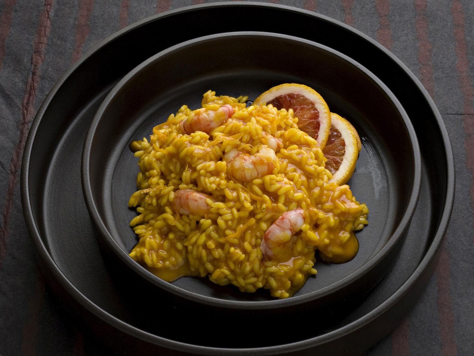 Saffron risotto with prawns and oranges