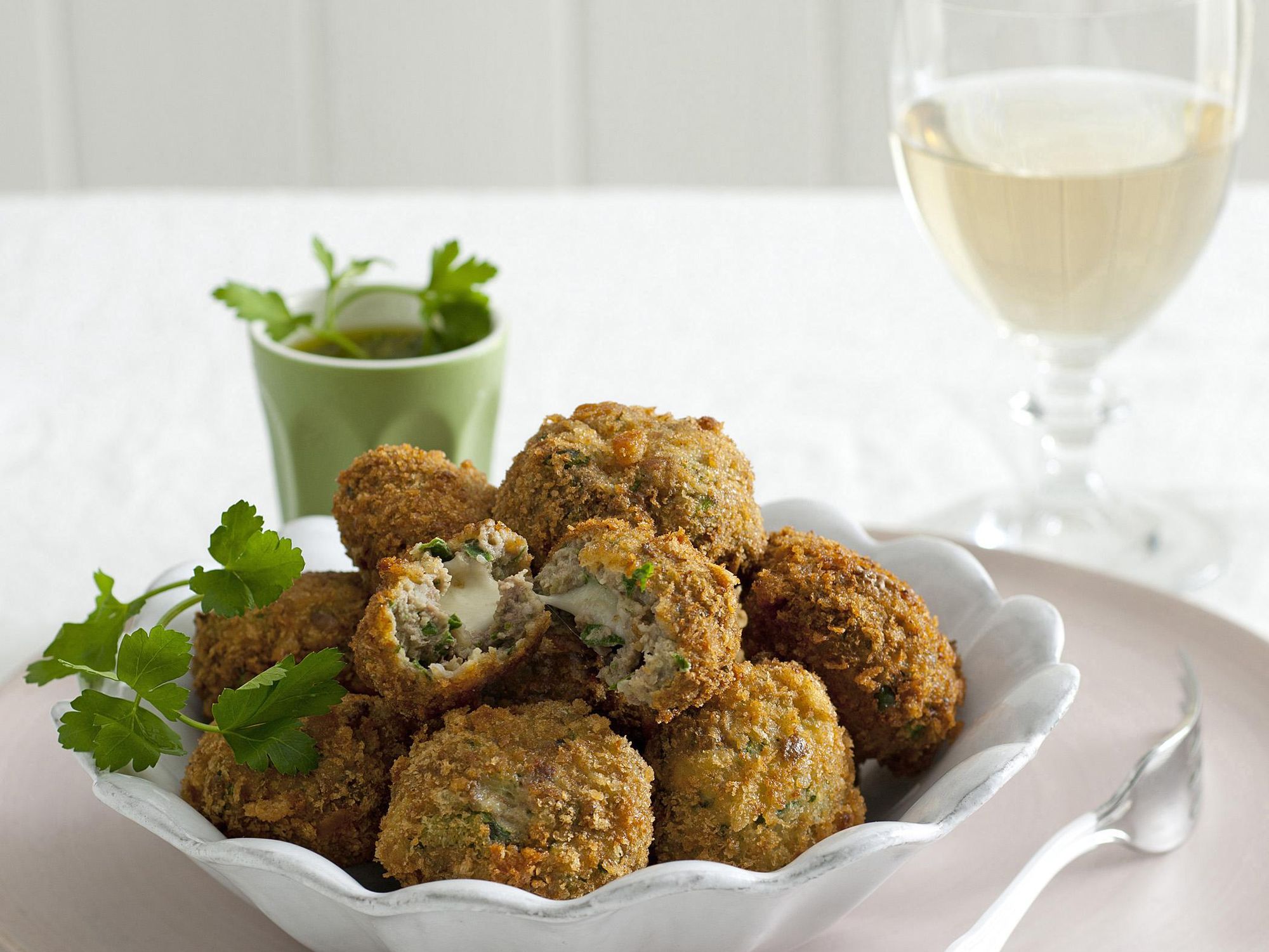 Potatoes croquettes, chard, and mozzarella heart