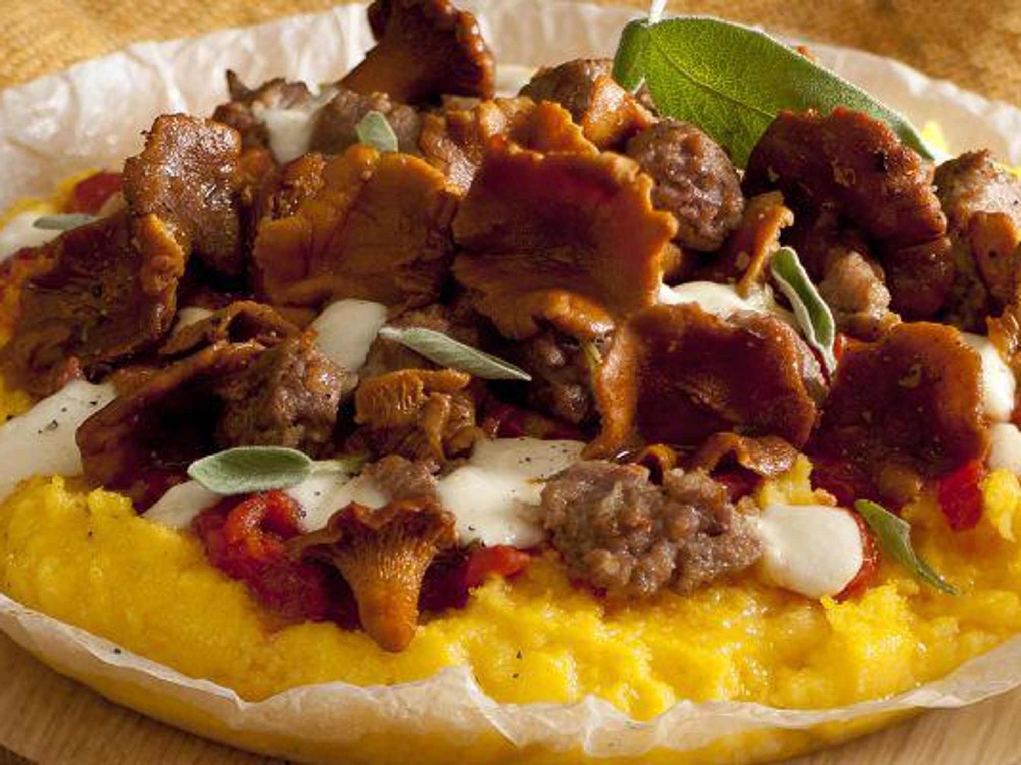 Polenta pizza with fennel mushrooms and sausage
