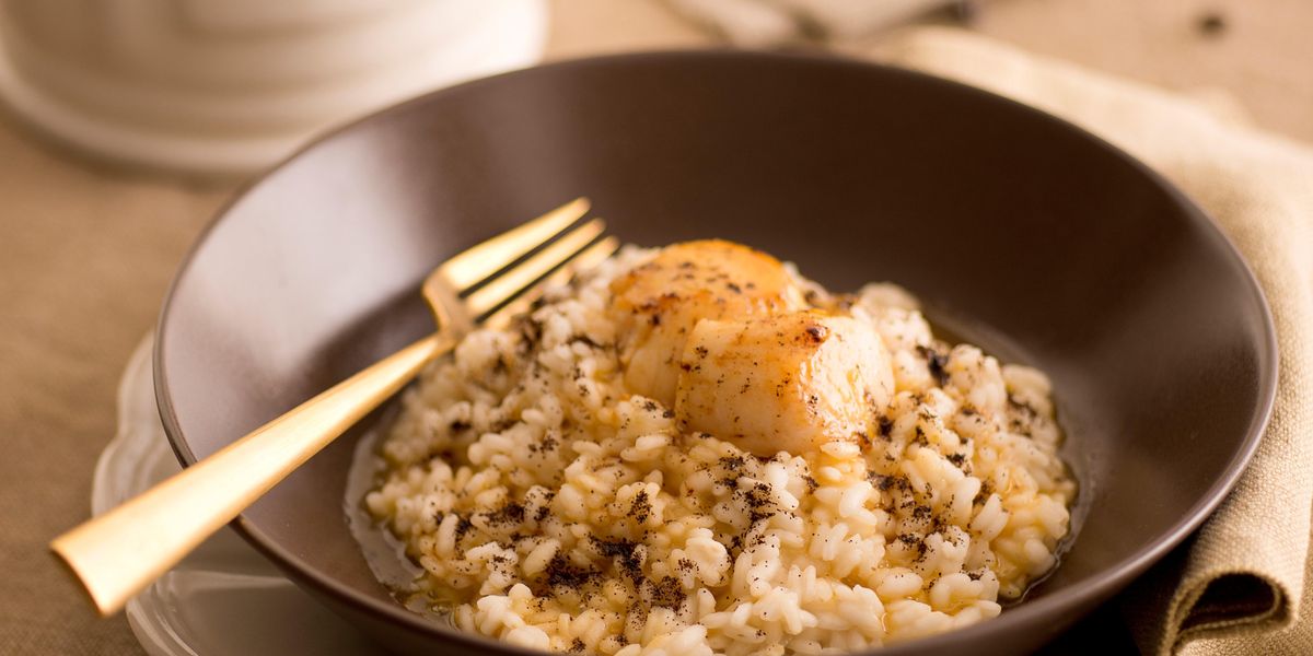 Coffee risotto with lemon zest and scallops