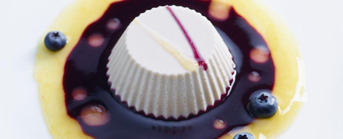 Vegan panna cotta with orange and blueberry cream