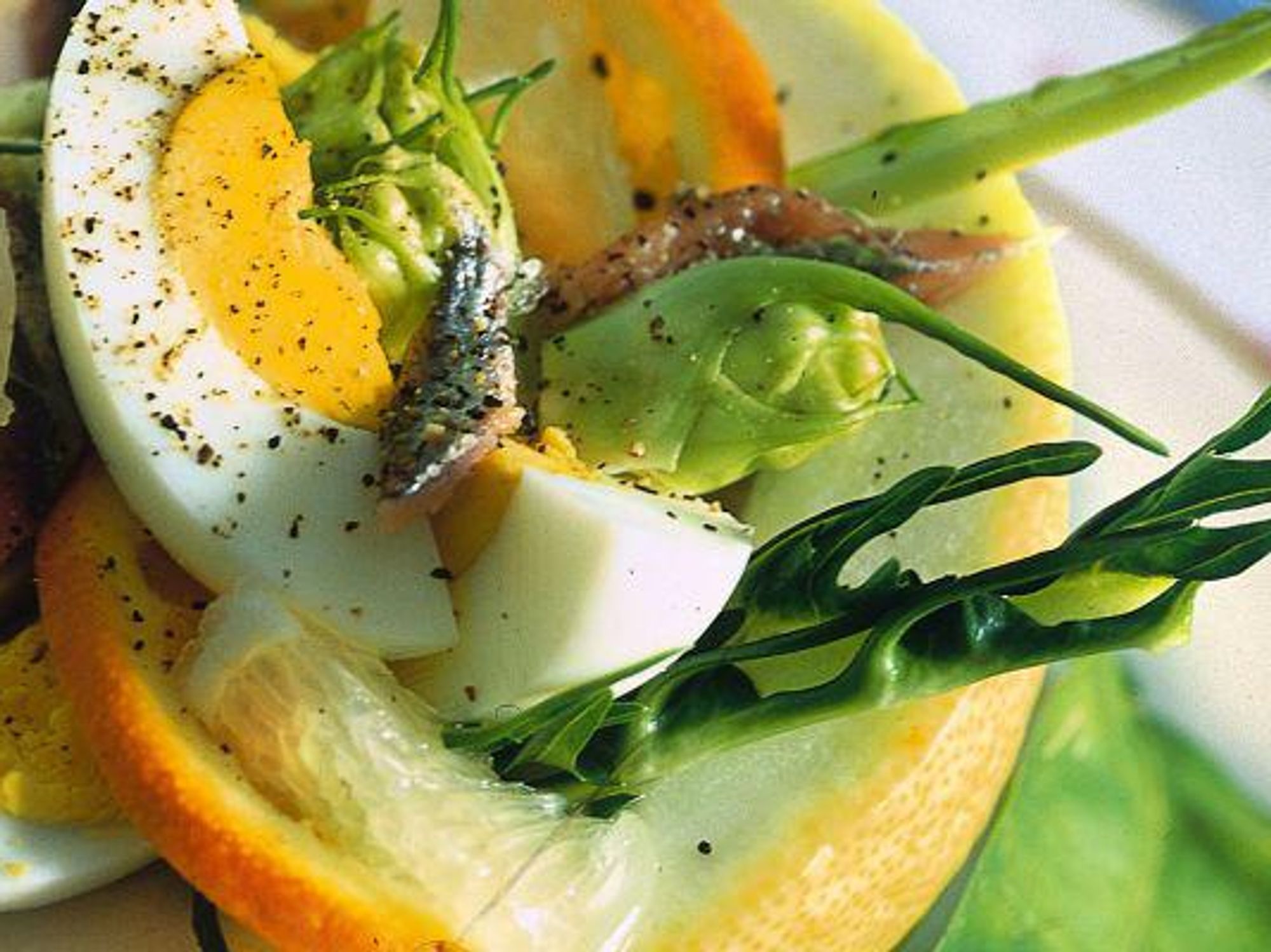 Mixed salad with citrons and hard-boiled eggs