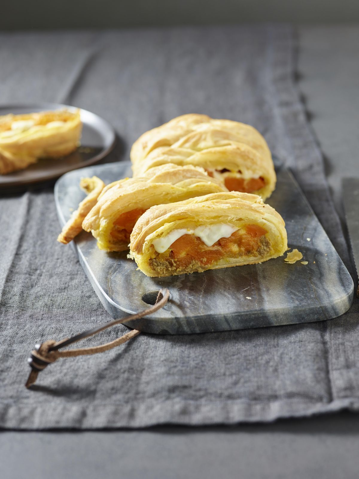 Pastry braid with green olive tapenade and pumpkin
