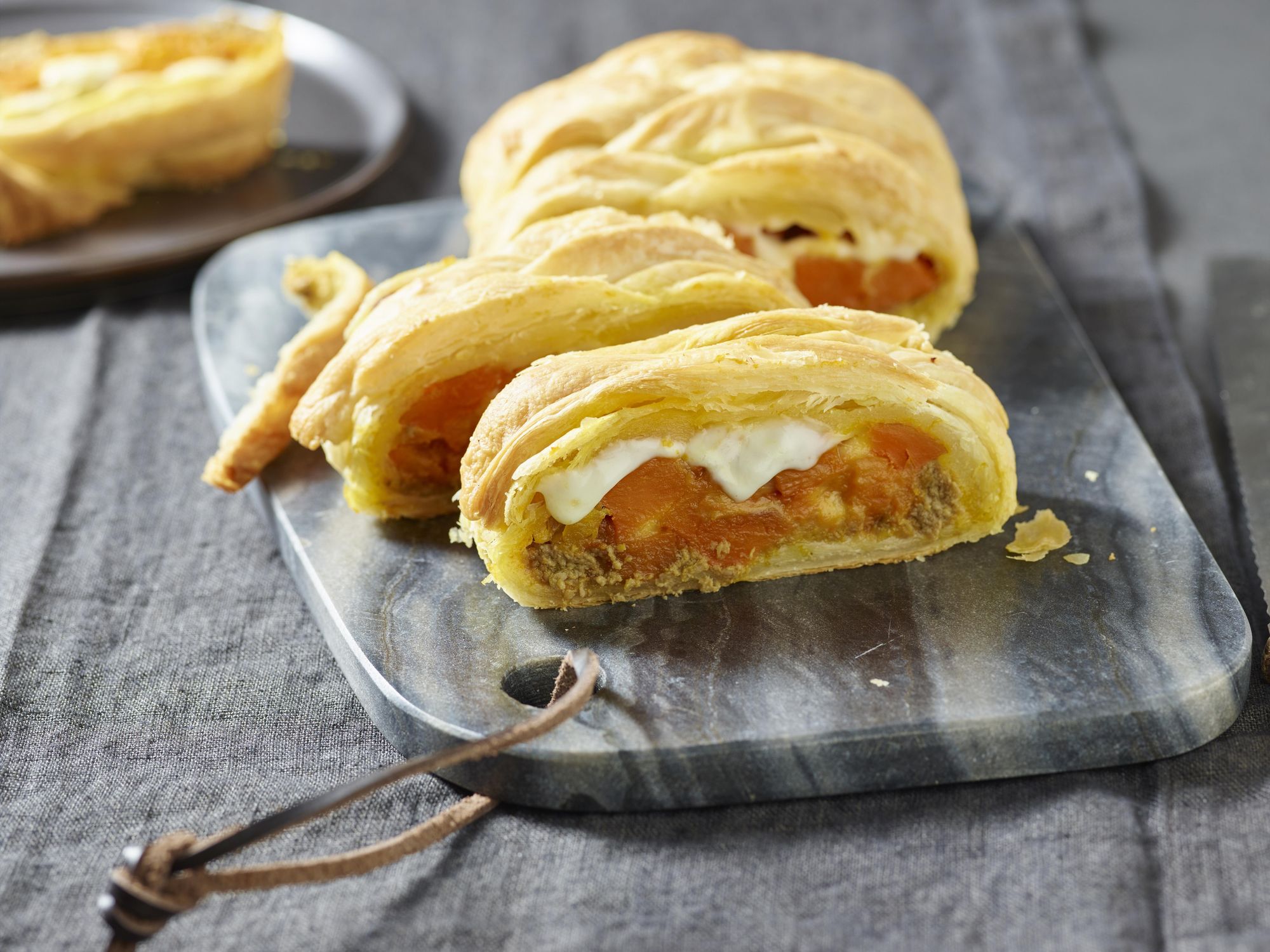 Pastry braid with green olive tapenade and pumpkin