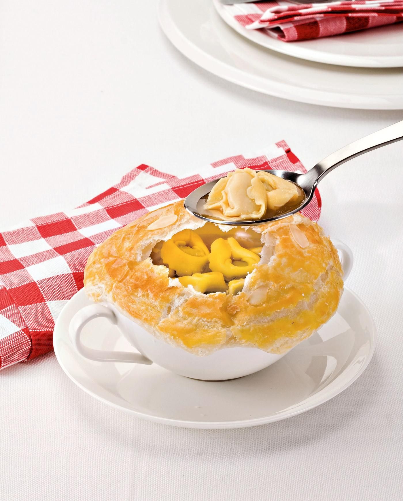 Tortellini in broth with puff pastry crust